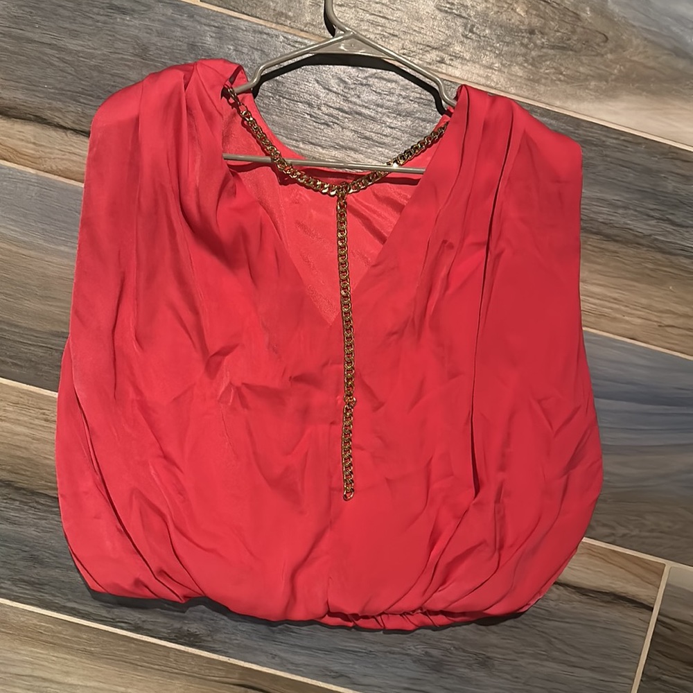 Pink sleeveless blouse